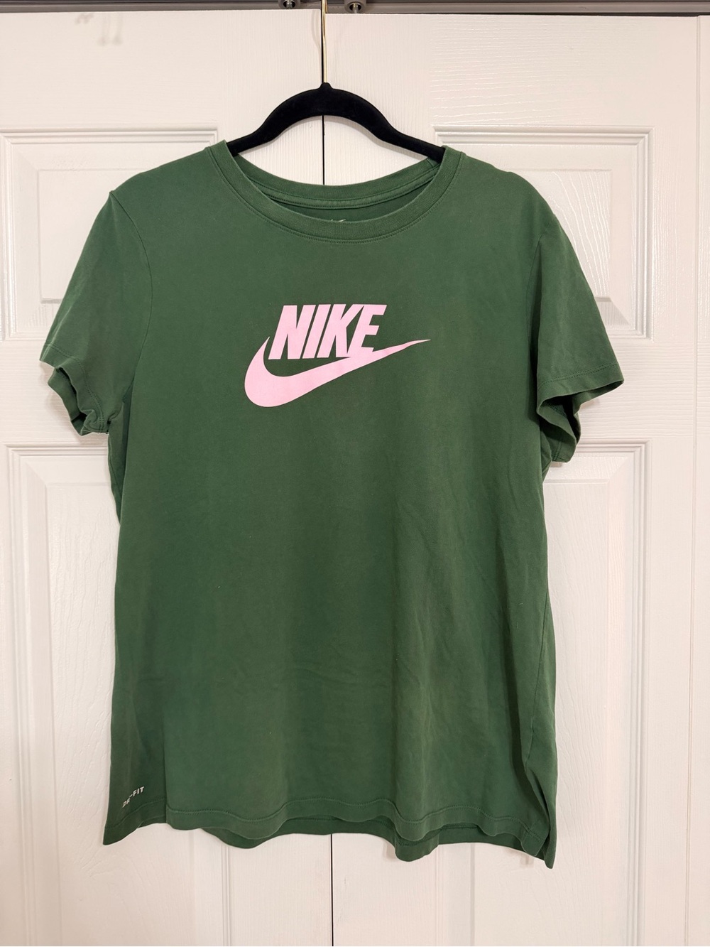 Woman’s Nike Green Short Sleeve Tee with Pink Swoosh